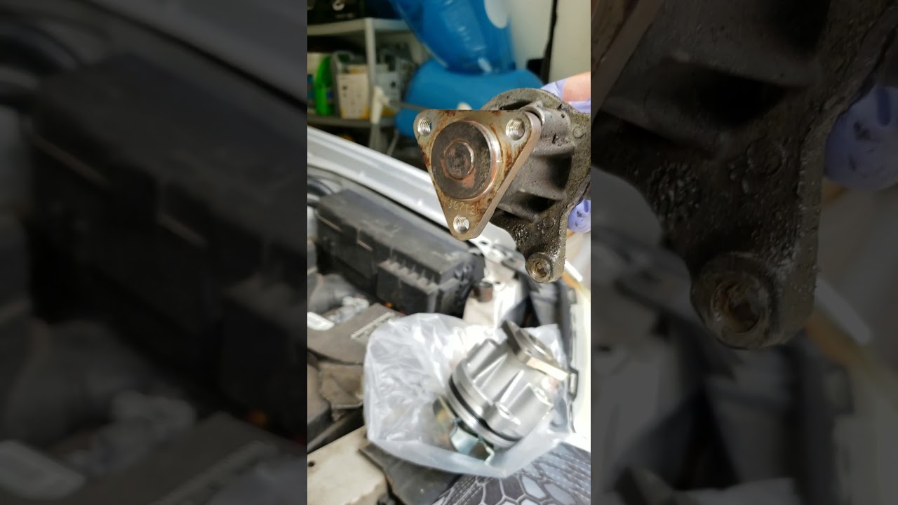 2006 mazda tribute water pump change 2.3L/l-4