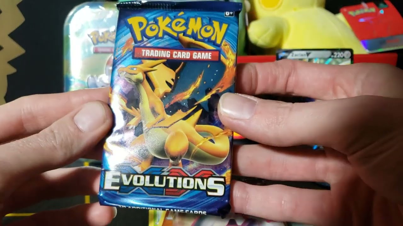Pokemon Galar Friends Mini Tins from 2020 with a RH Charizard pull from Evolutions!