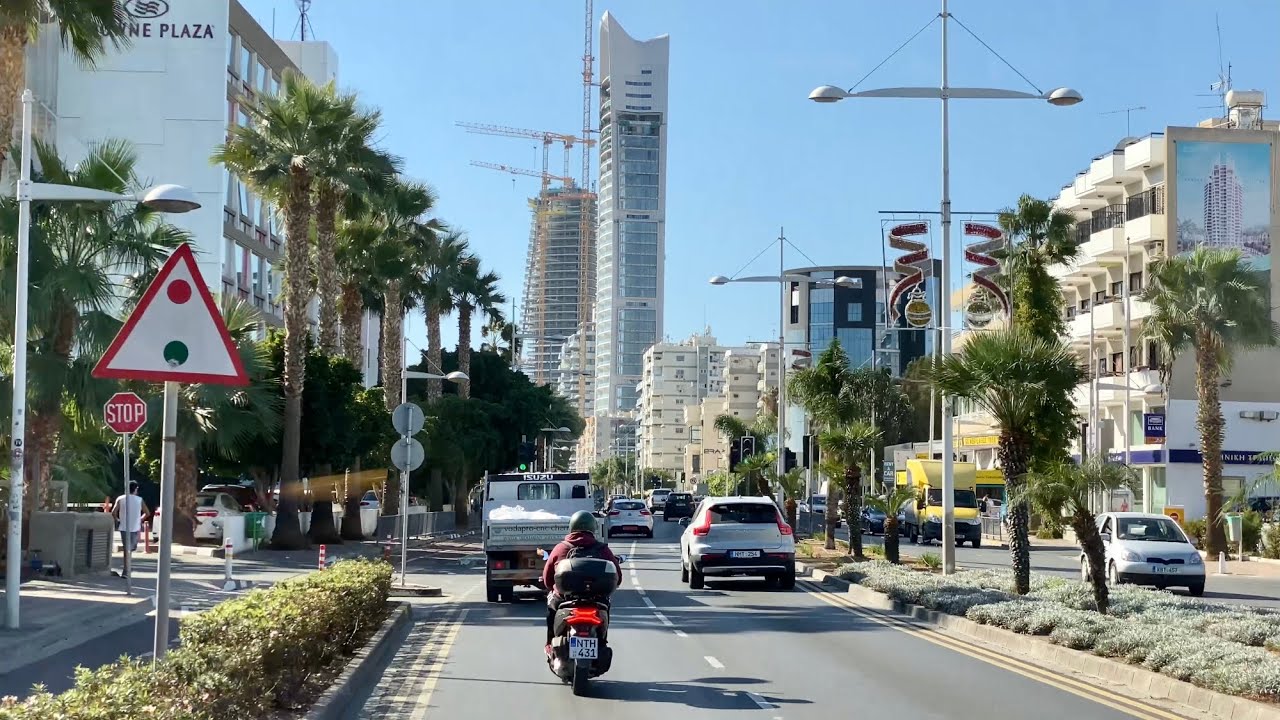 Bus ride in Limassol from Mediterranean Beach Hotel to Era Olympia store. Bus 30, seaside road.