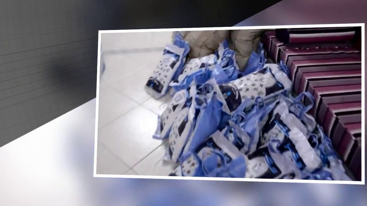 شباب القوز يوزعون سلات غذائية رمضانية على المنازل عام 1435هـ