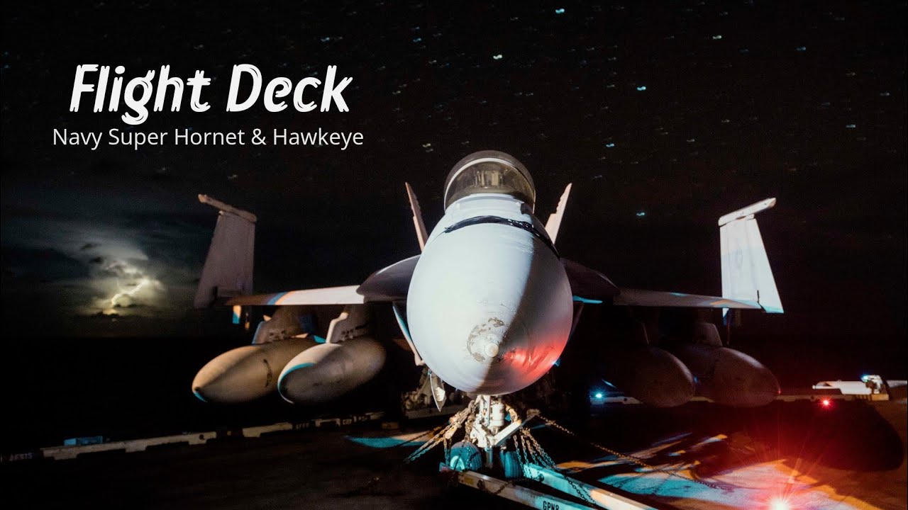 Navy Flight Deck - F-18 Super Hornets, E-2C Hawkeye and Flight deck Crew Members
