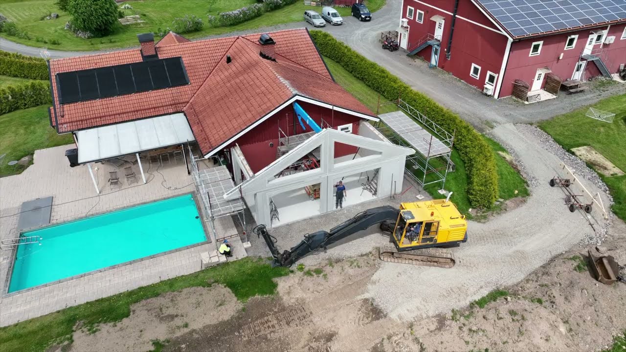 Tillbyggnad del 12 sätter upp Limträbalk m.m.