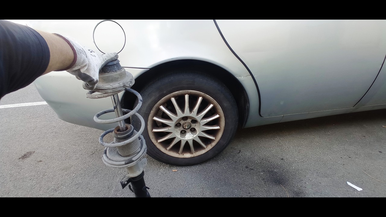 Sostituzione ammortizzatori posteriori alfa romeo 147 - 156 - Gt. Manutenzione Alfa Romeo