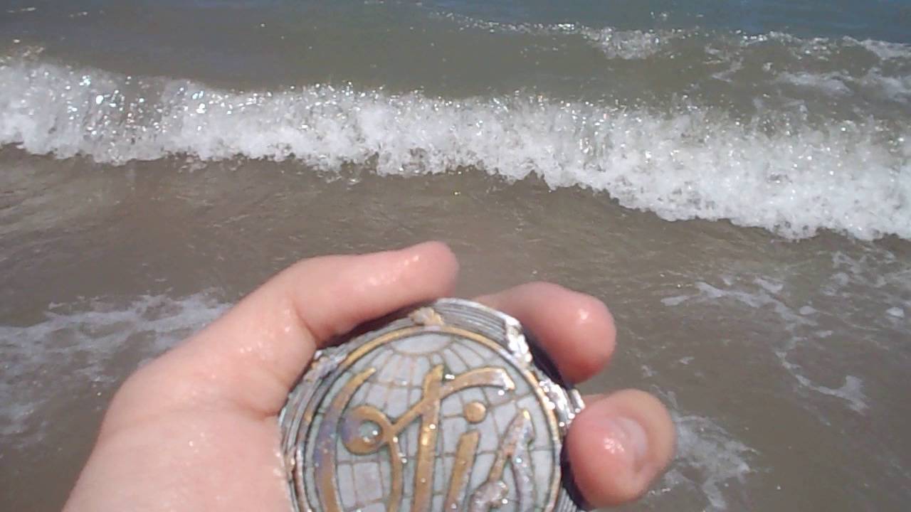 Having fun with the waves in the ocean featuring my Otis globe! for DieselDucy