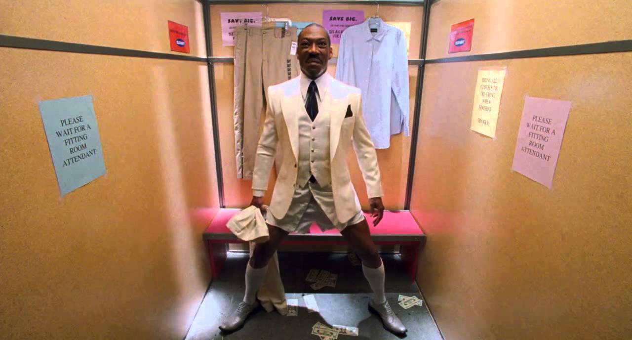 Eddie Murphy poops money
