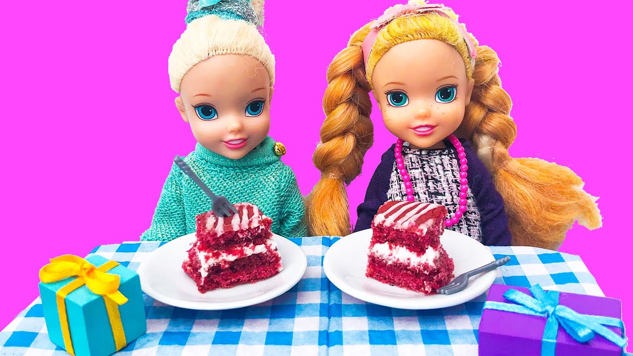 Elsa and Anna toddlers at a birthday party