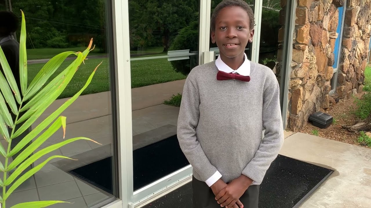 Young Boy Plays The Star-Spangled Banner on Grand Piano