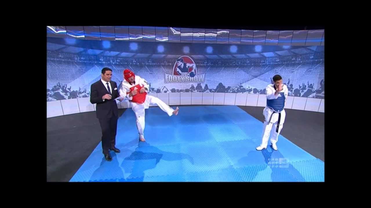 Sam Newman attemps to take on Sam Khalil & Carmen Marton