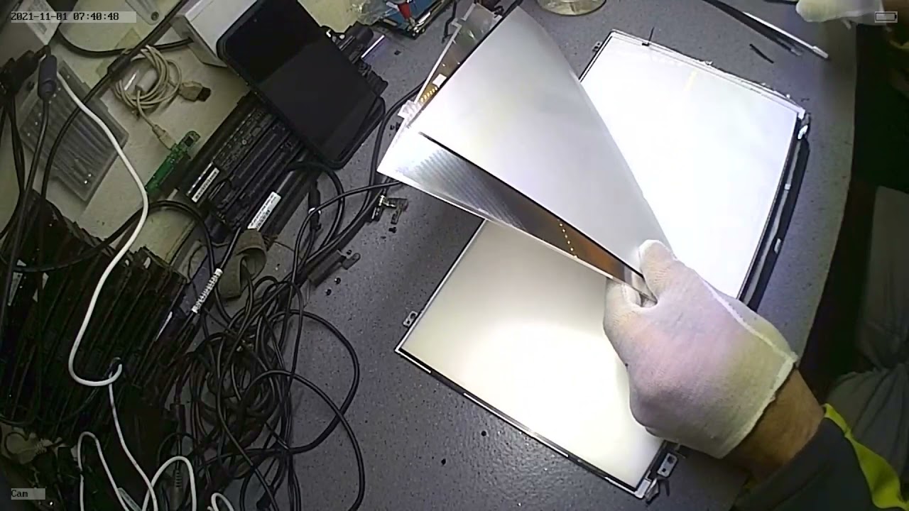 Remove water from under laptop screen.