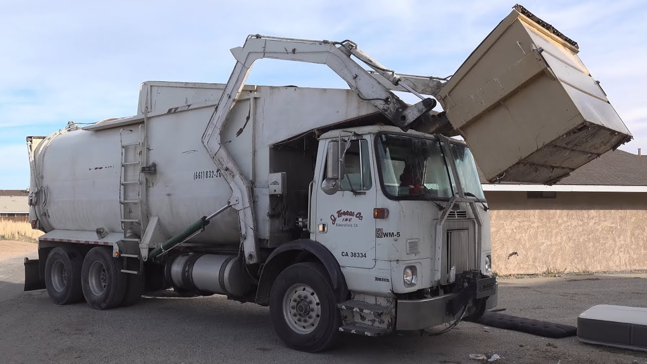 J Torres Co. Autocar WX ￼Amrep Elliptical Front Loader Garbage Truck 