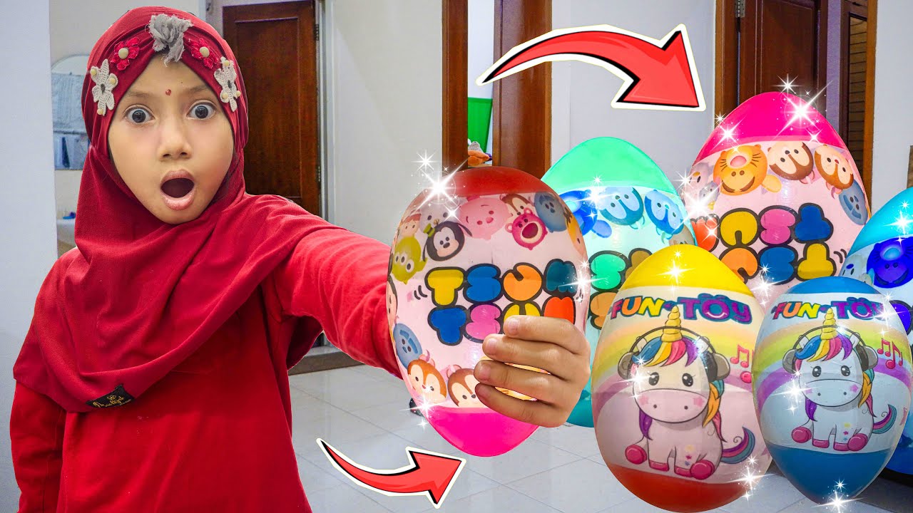 AQILA UNBOXING TELUR BERHADIAH DI RUMAH