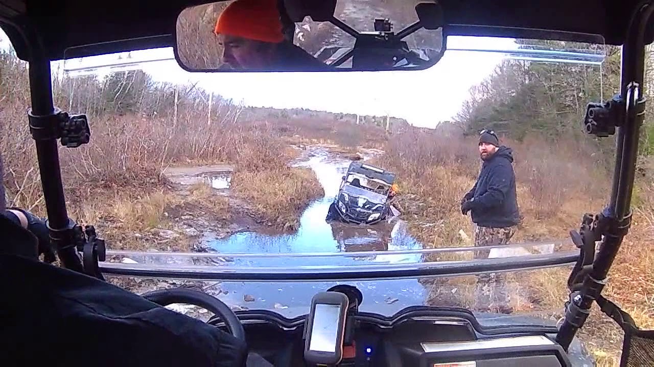 Kymco UXV 450i winching out my buddy.