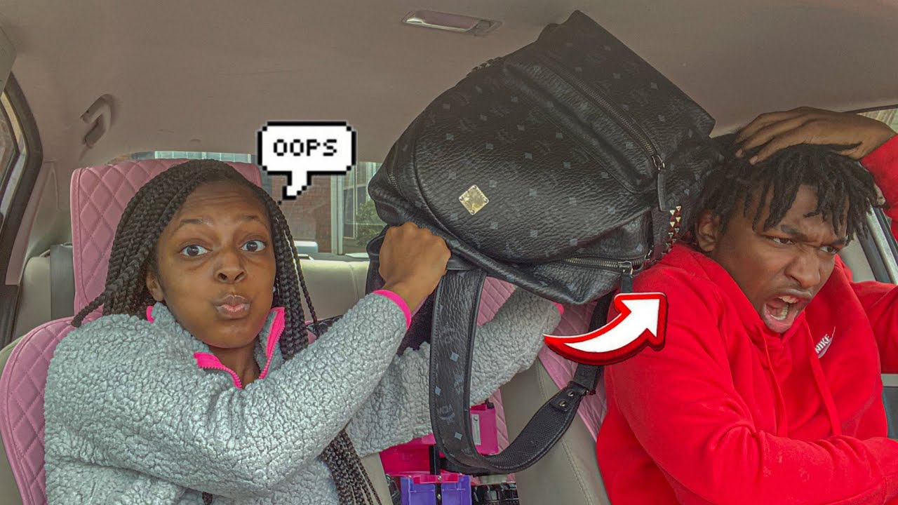 HITTING MY BOYFRIEND WITH MY PURSE PRANK TO SEE HIS REACTION... *HE WENT OFF*