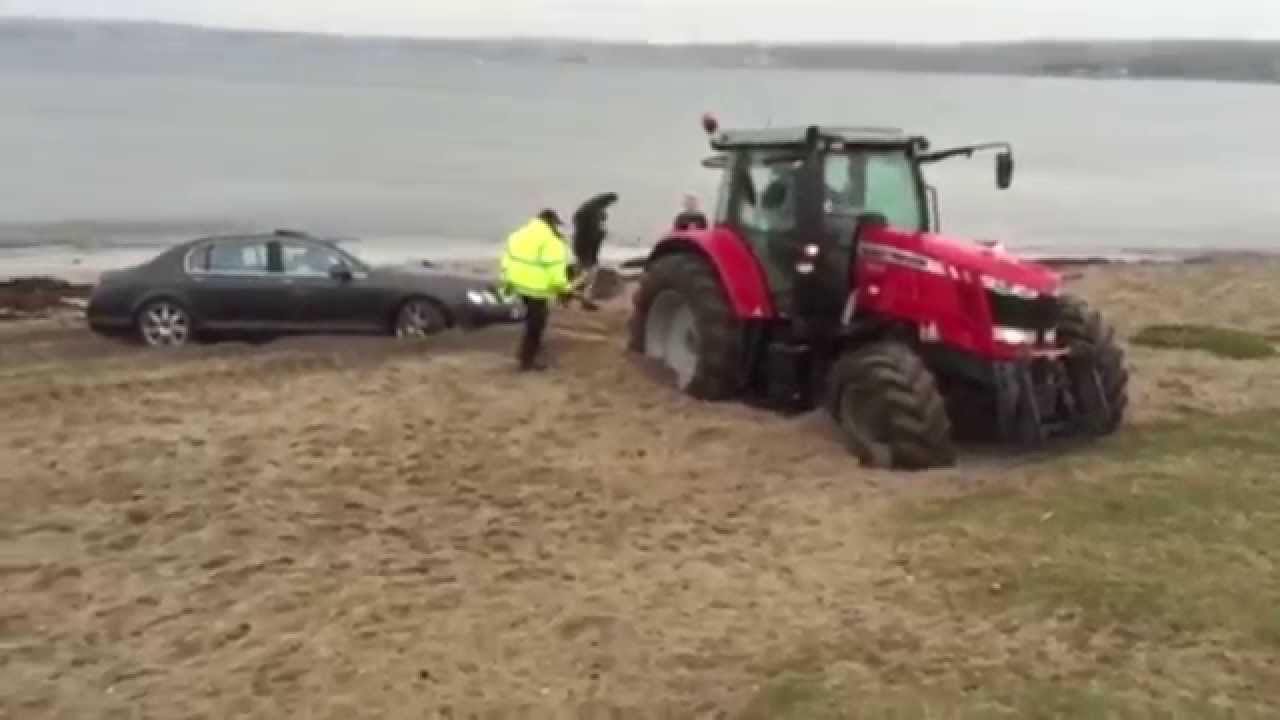 &pound;120,000 Bentley stuck on a beach &ndash; had to be rescued by tractor