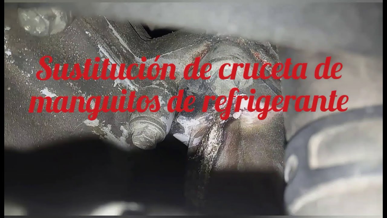 Sustitución de la cruceta de manguitos del refrigerante en Jaguar XK8. Change cross pipe coolant.