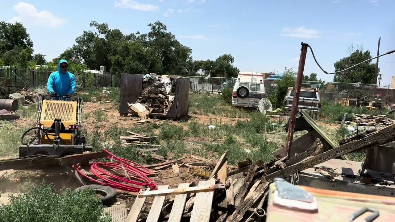 Using the CRT23 mini skid steer for clean up