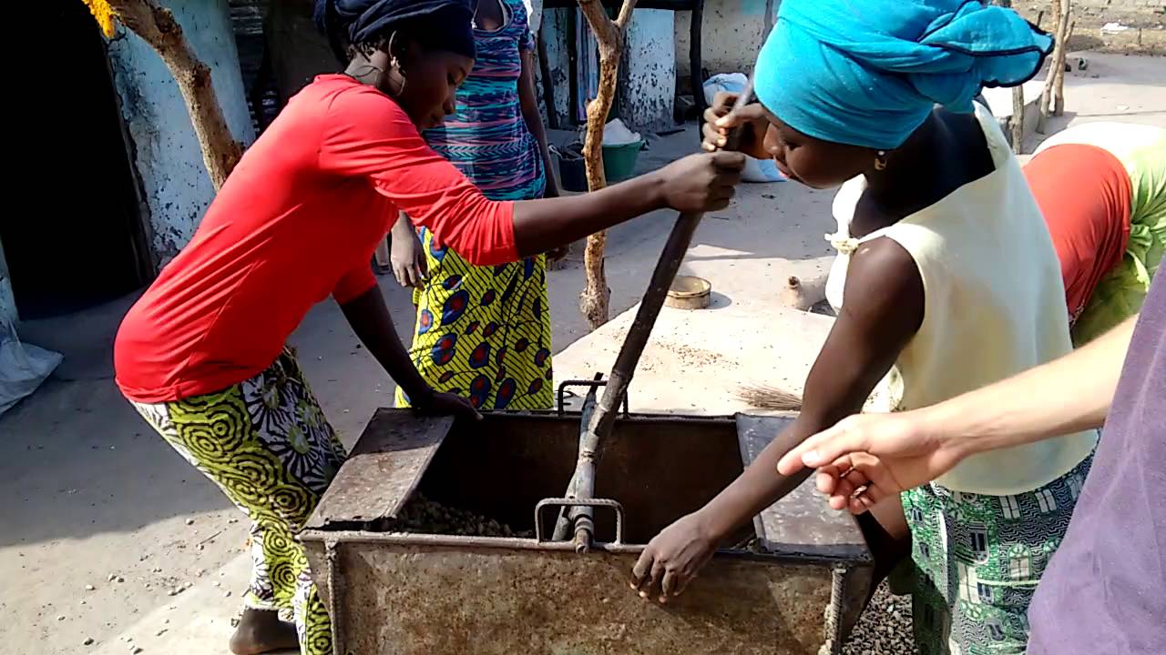Nyima & Amara Shucking Peanuts