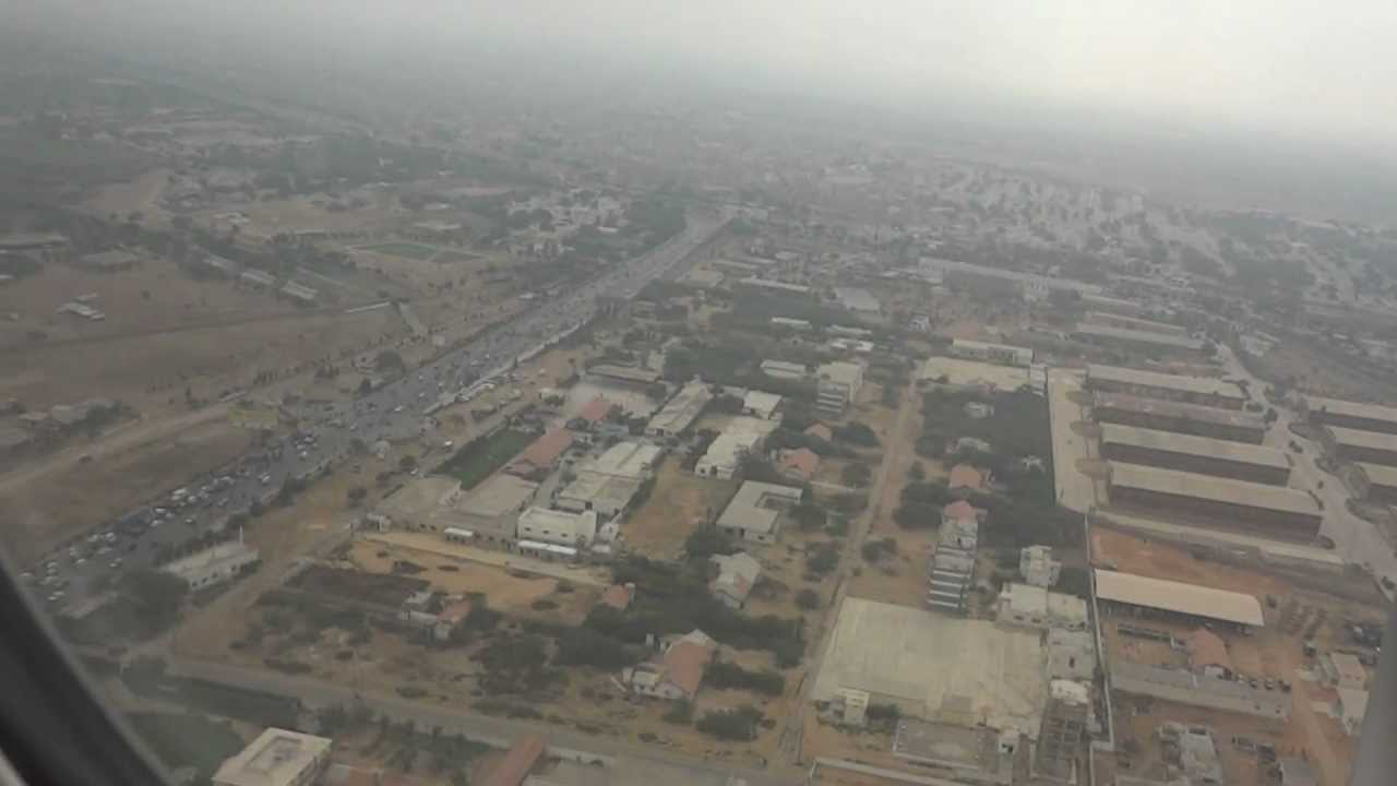 Landing At Karachi Airport by Emirates Boeing 777-300 plane