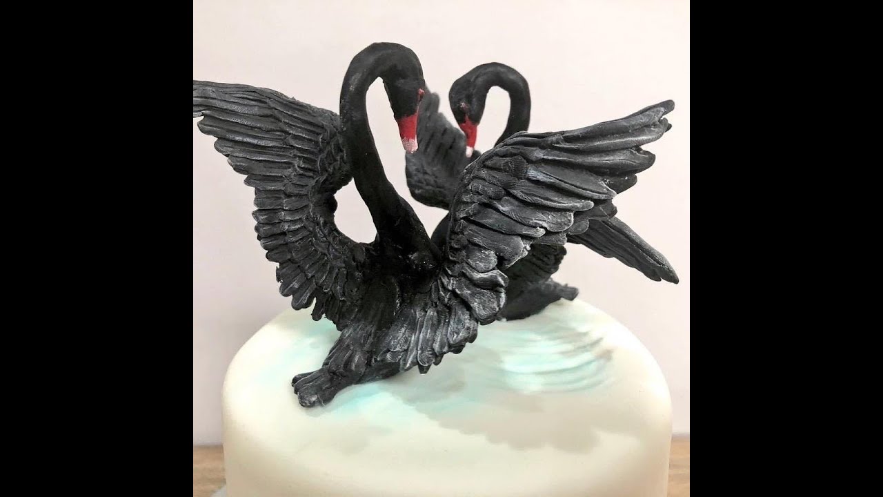 How make and colour modelling chocolate and make a modelling chocolate swan.