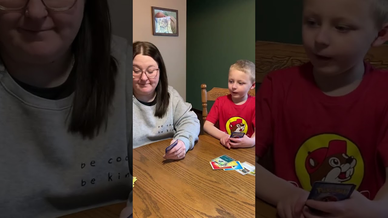 Baker and Mom unwrap Pokemon Cards