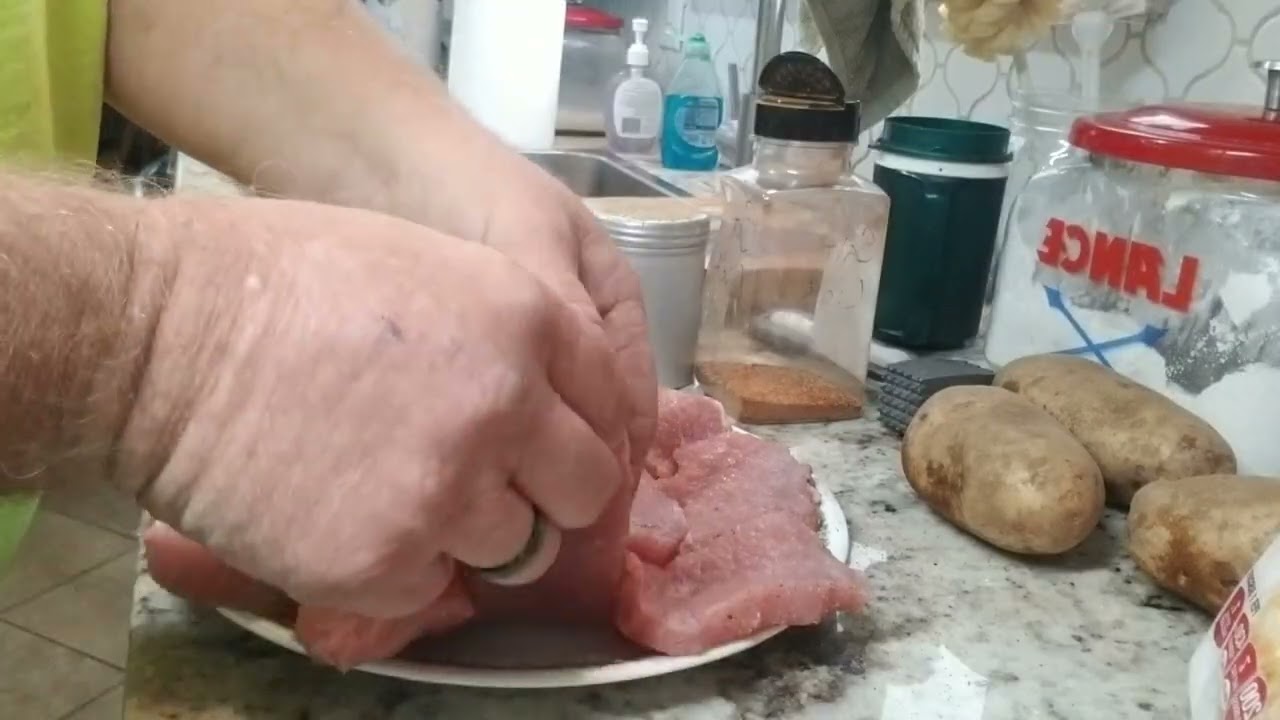 Fried pork chops and taters.