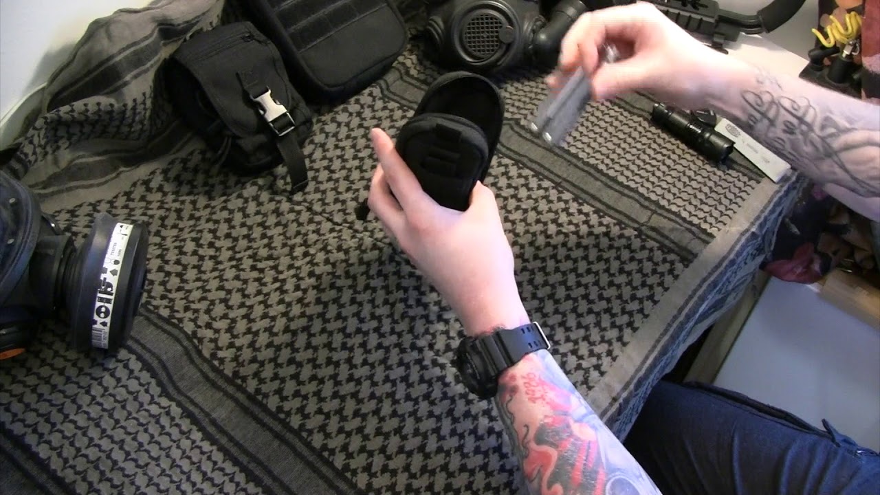 Looking At Condor Outdoor MA45 iPouch Molle Pouch and survival knife