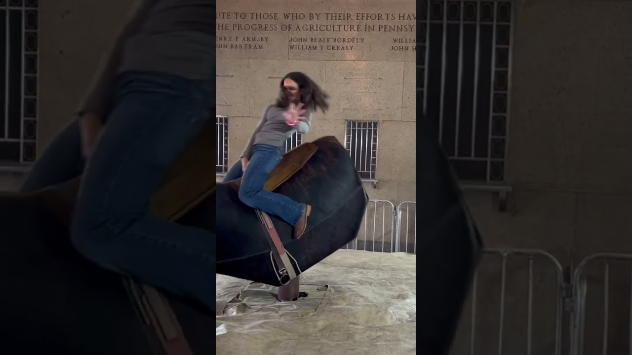 Cowgirl Riding Mechanical Bull at the 2024 PA Farm Show