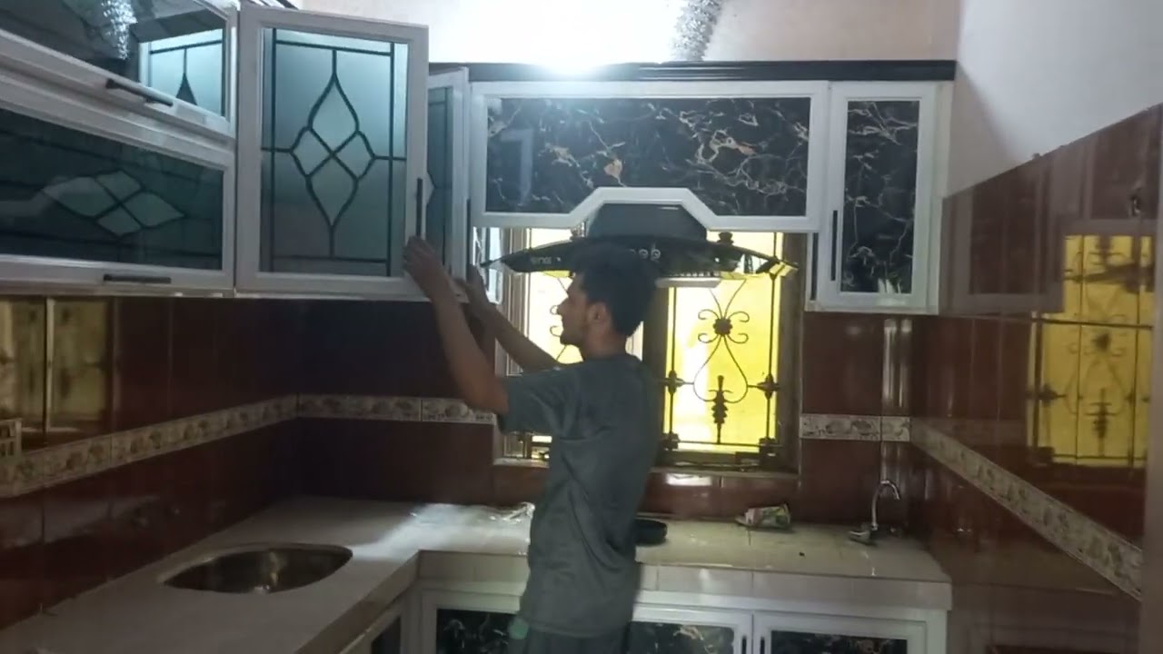 aluminium kitchen cabinets modern design with black marble design sheet and print glass