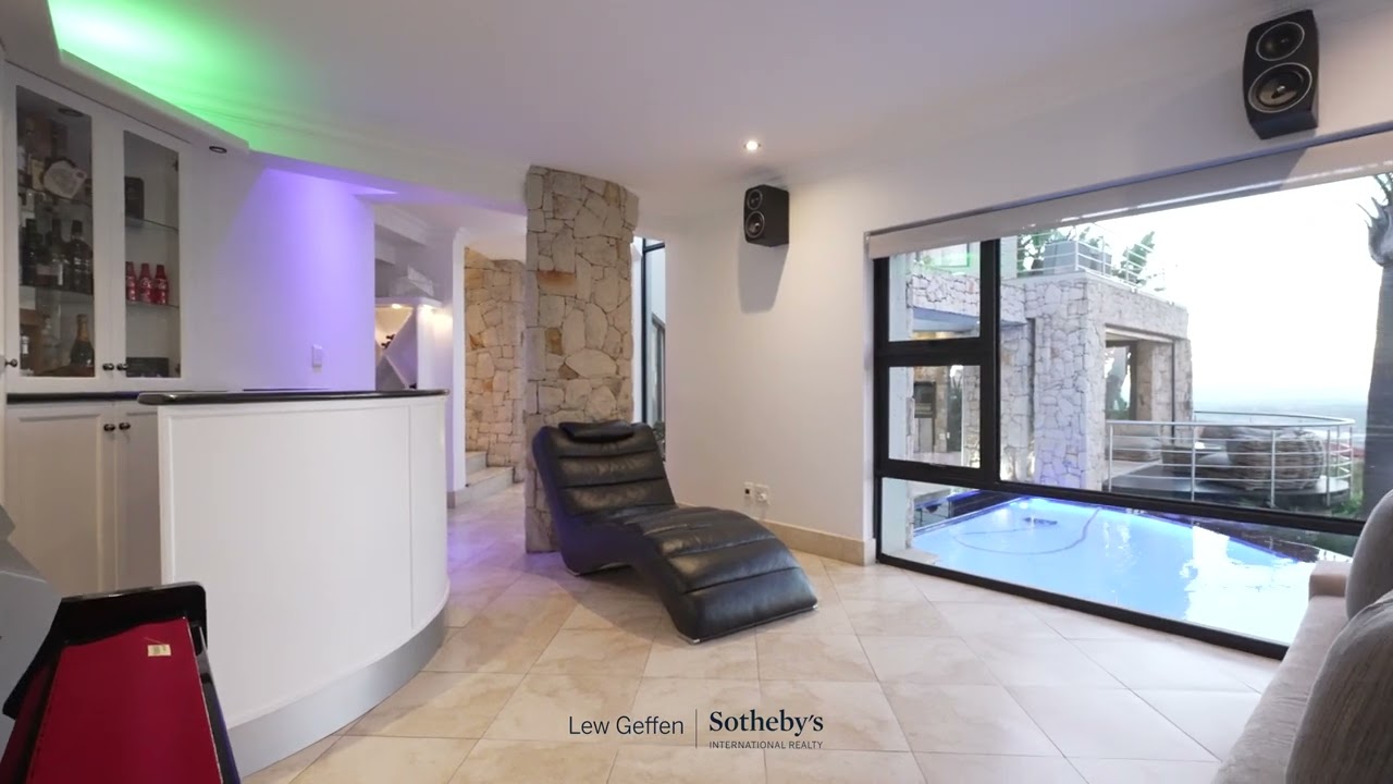 Immaculate Architectural Masterpiece with Panoramic Views in Constantia Kloof
