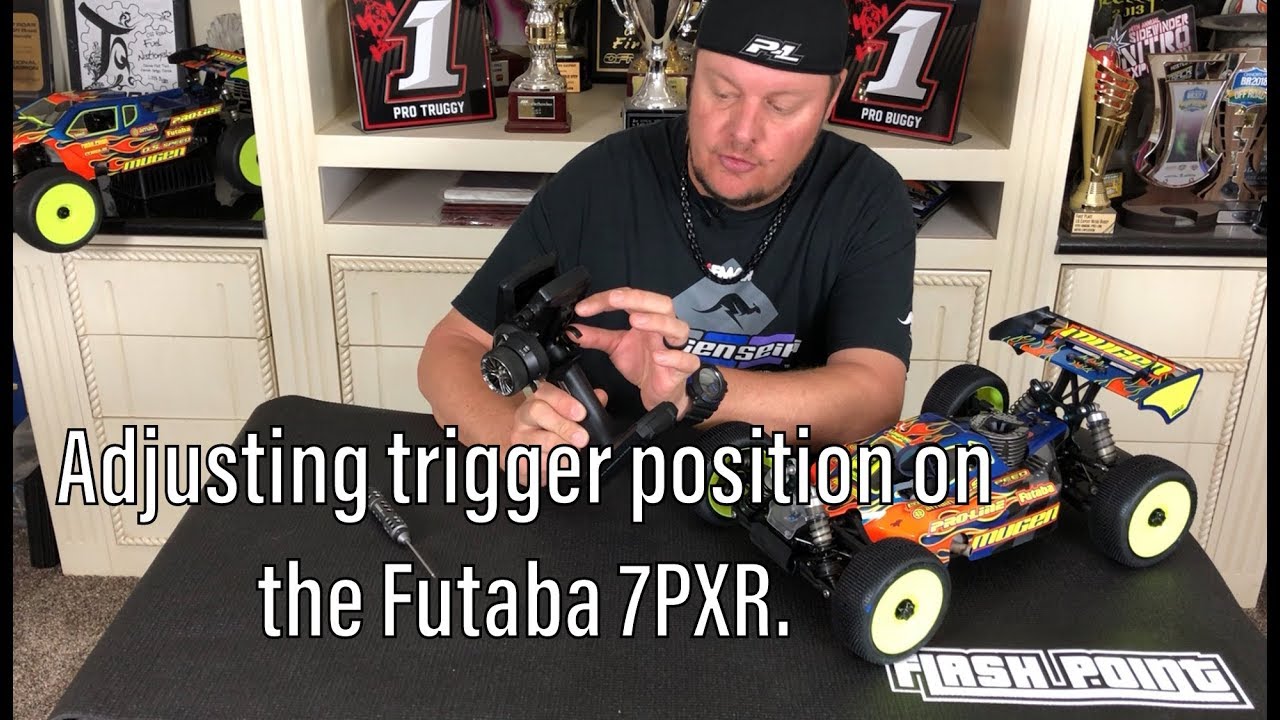 Adam Drake shows how to adjust the trigger position on the Futaba 7PXR .