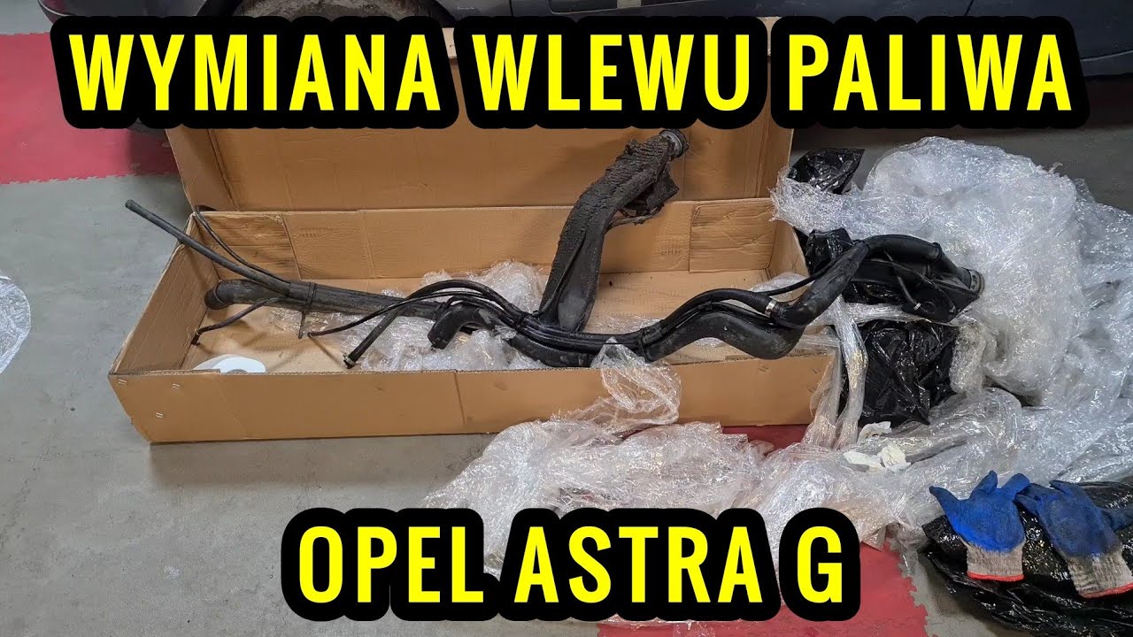 Opel Astra G: Wymiana wlewu paliwa do zbiornika paliwa 