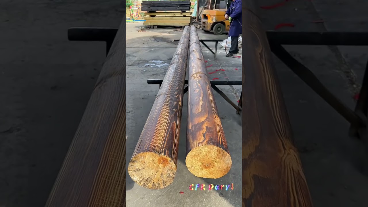 Carbonize the surface of two logs with flame gun