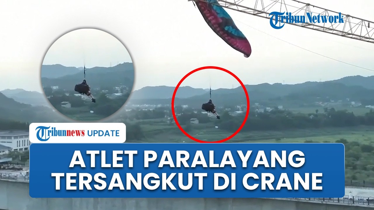 Detik-detik Menegangkan Petugas Damkar China Selamatkan Penerbang Paralayang dari Crane Proyek