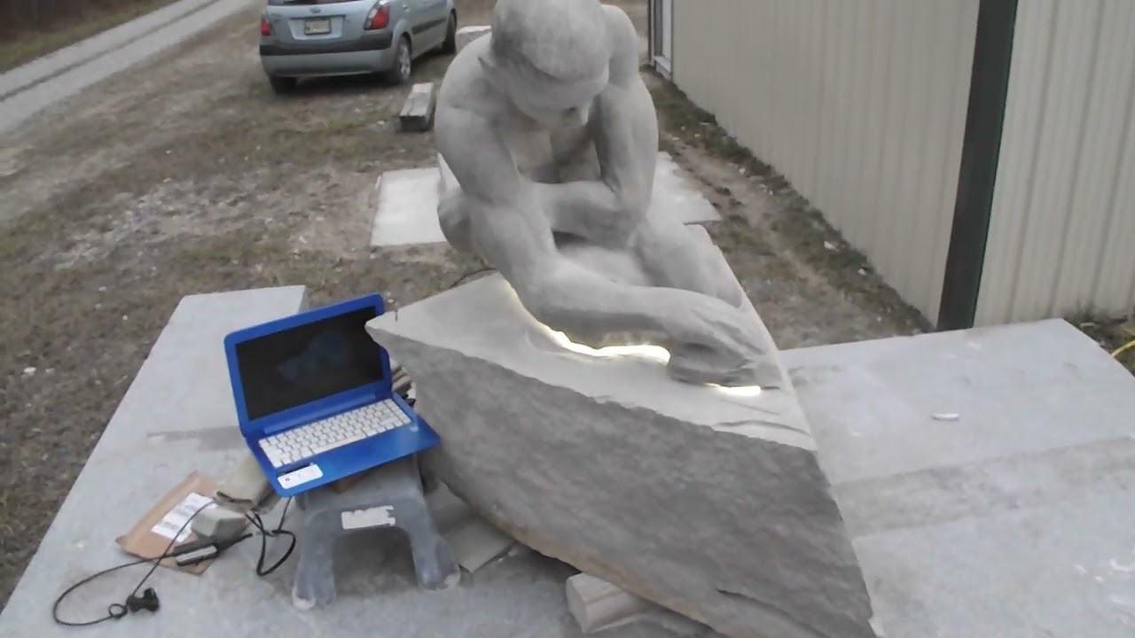Carving Stone - Adding light to Gathering Light sculpture
