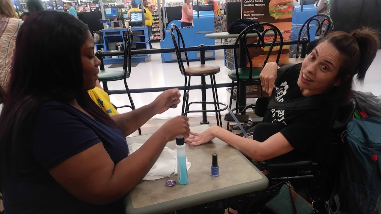 Kind Walmart Employee Paints Nails For Woman With Cerebral Palsy