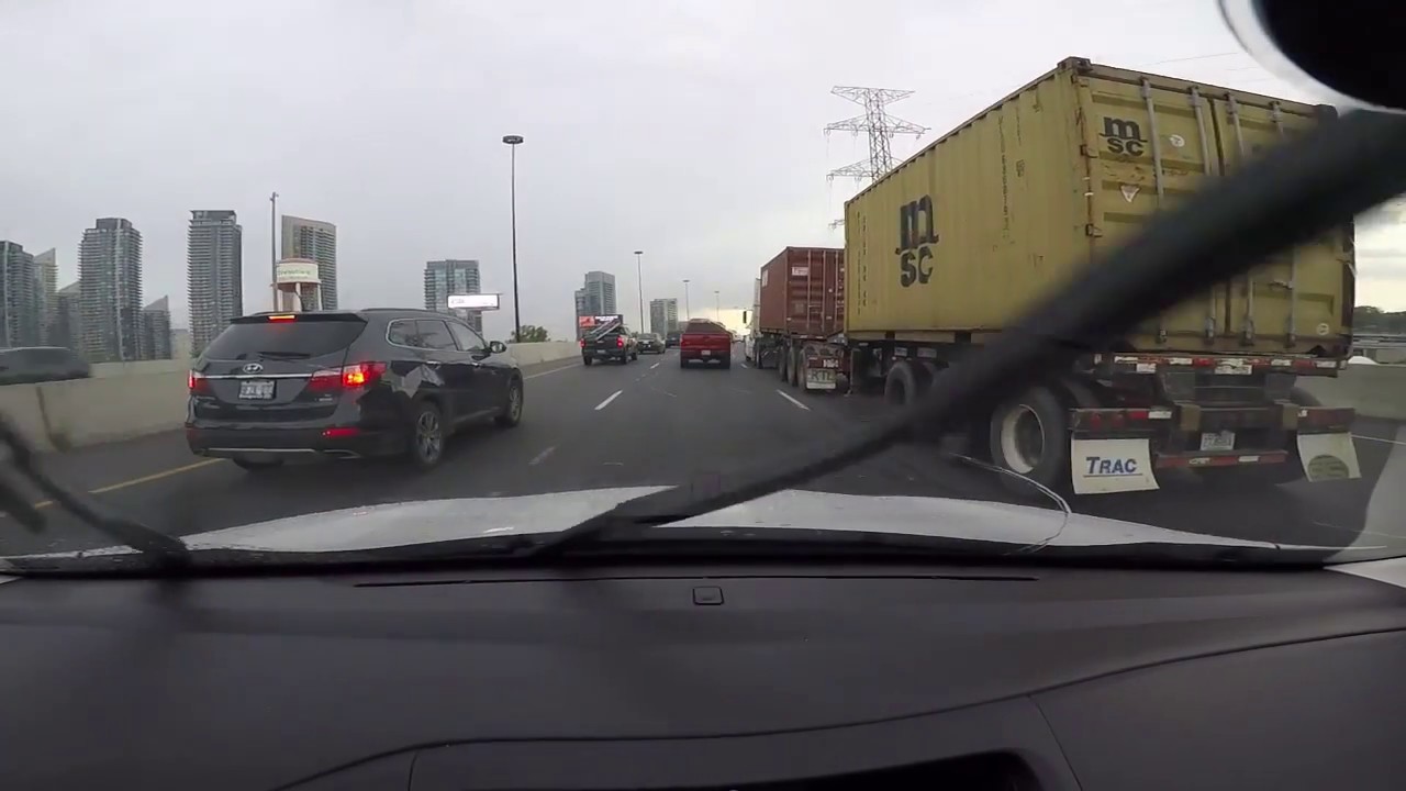 KD-60-  DRIVING ON WEST BOUND ON GARDNER FROM DOWNTWON TORONTO TOWARDS NIAGARA FALLS, ONTARIO CANADA