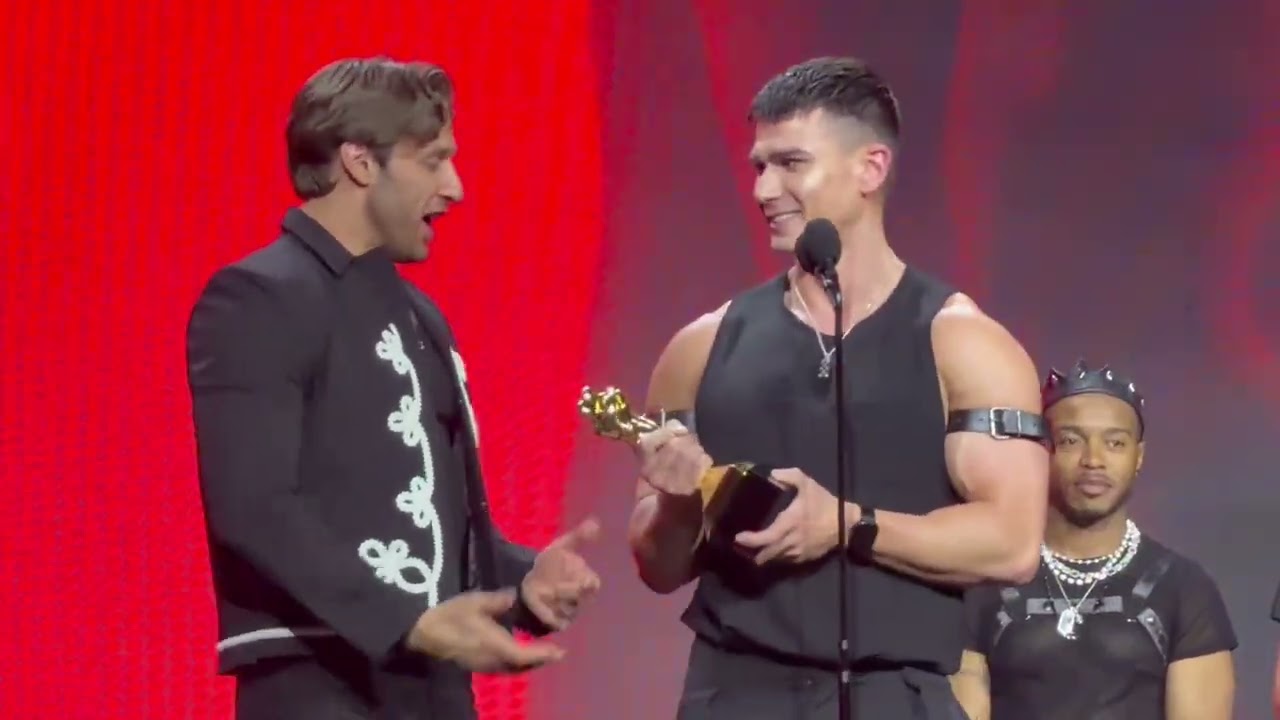 Dom King and MrDeepVoice accept the award for Best Fourgy Scene, Dawn of The Gladiators.