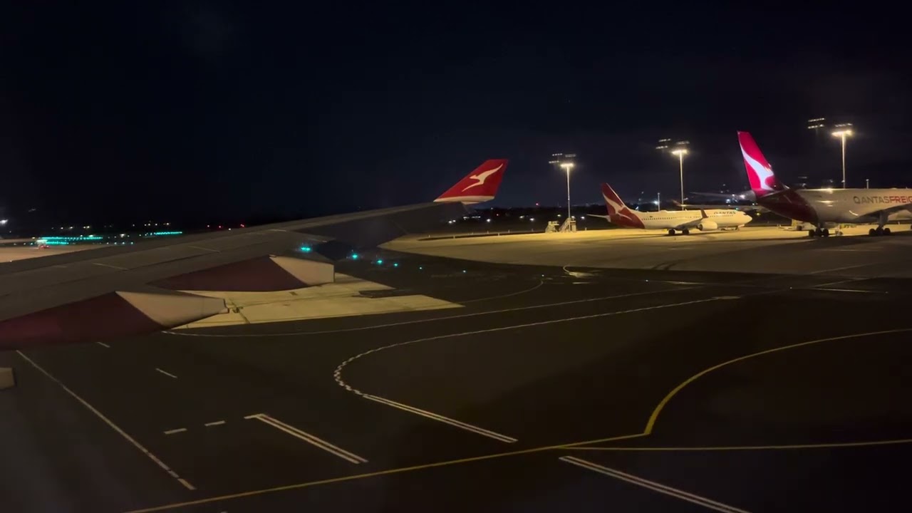Qantas airways Flight 770 pushback from Gate 20 at Perth Airport