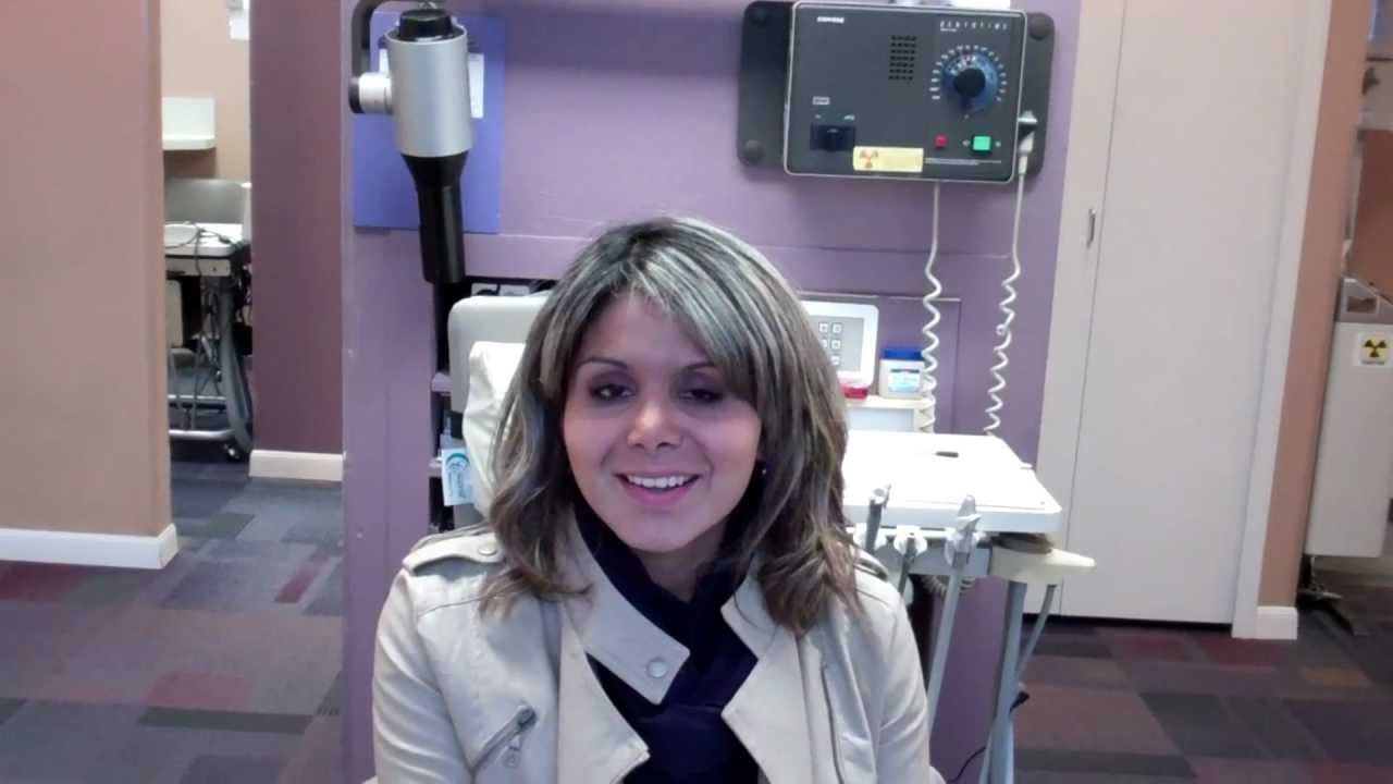 TMJ patient wearing her orthotic while describing her experience.