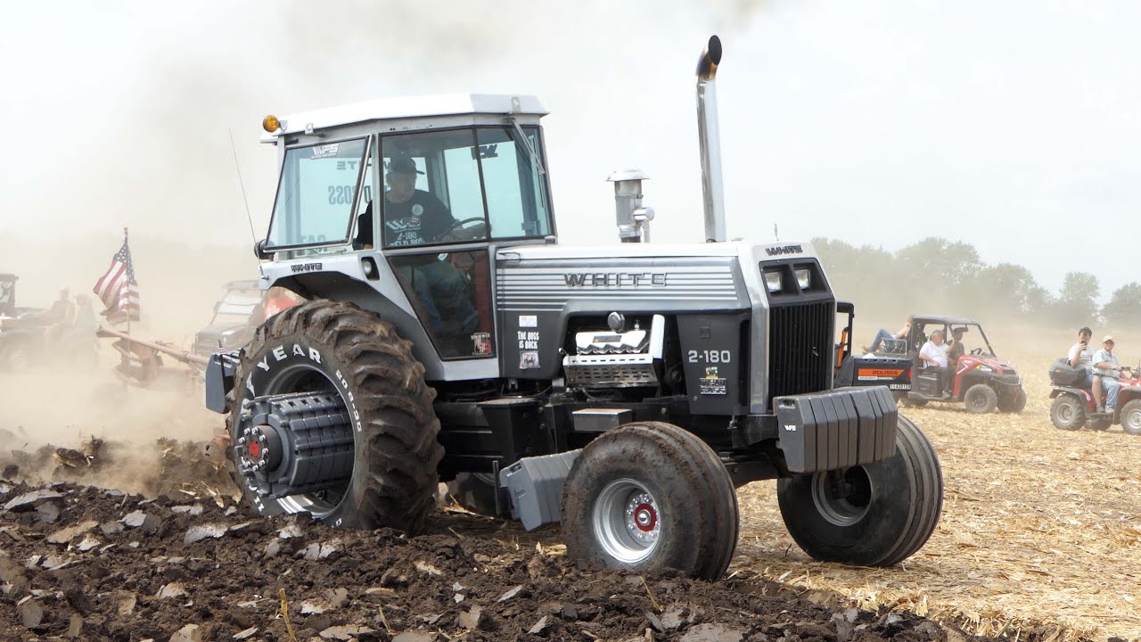 Vintage Tractors on duty Plowing