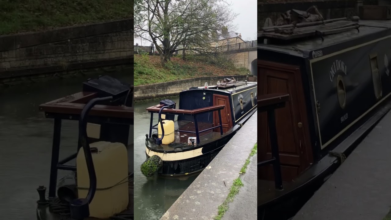 Narrowboat moored near Bath Deep lock on Kennet and Avon canal by Junction of canal and river #canal