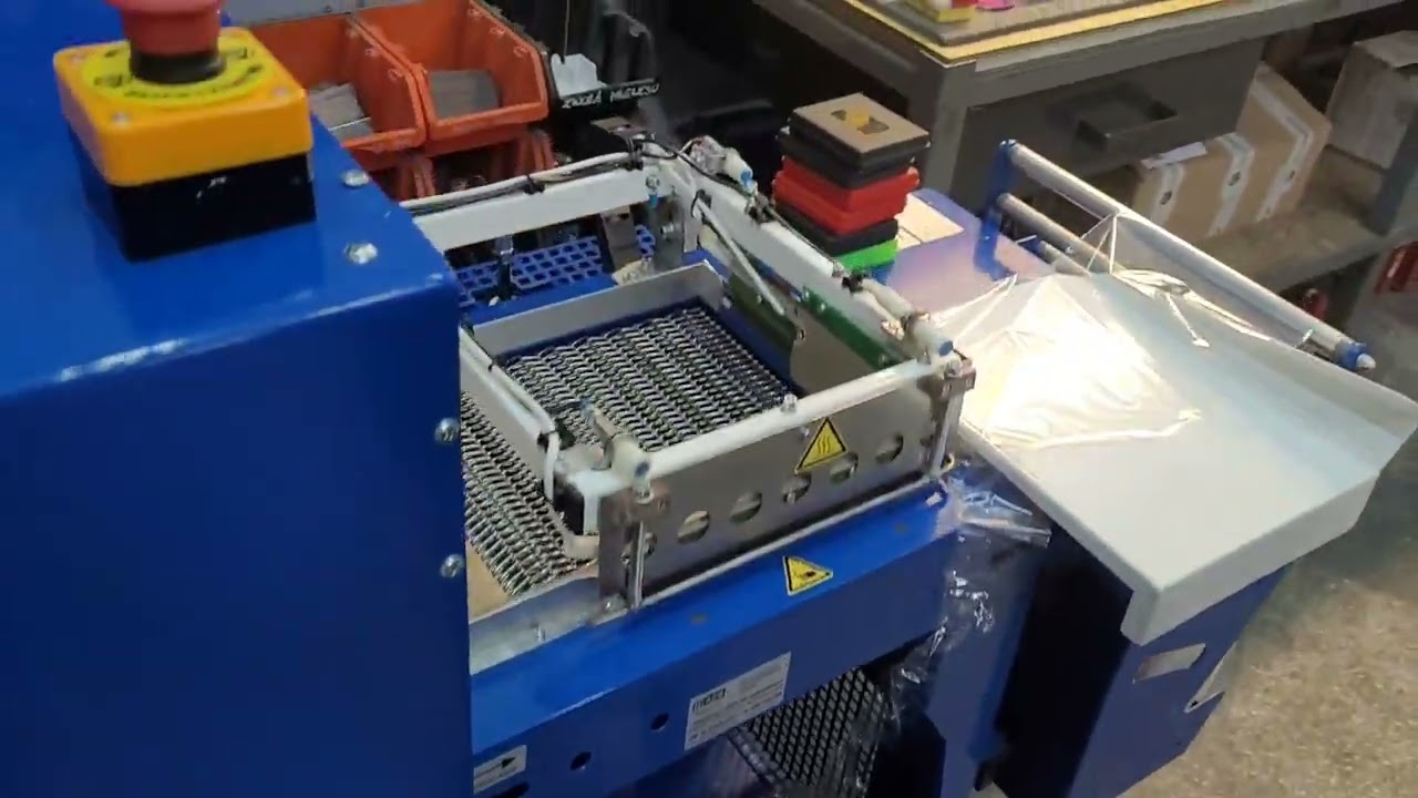 Półautomat kątowy ze zgrzewadłem stałocieplnym do szybkiego pakowania  folie termokurczliwe