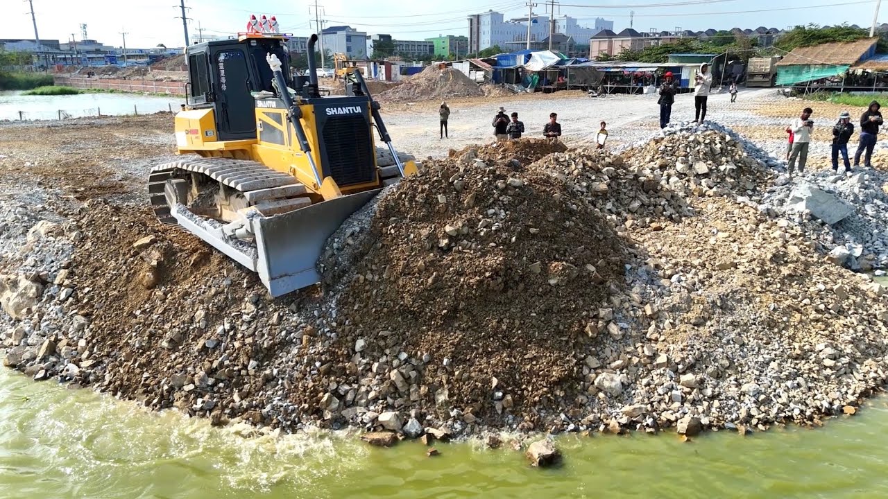 Nicely Landfill Task Using Shantui Dozer Dh17c3 Push Stone Into flood Block with Dump Trucks