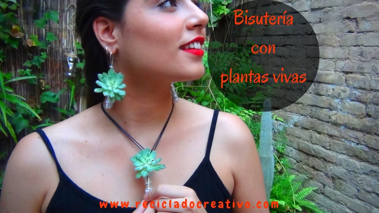 Bisuteria viva con plantas suculentas y tubos de perfume reciclados