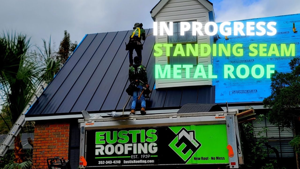 In Progress low gloss black metal standing seam roof - Eustis Roofing