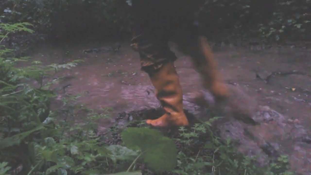 190806203 yellow Hunters and muddy raingear washing