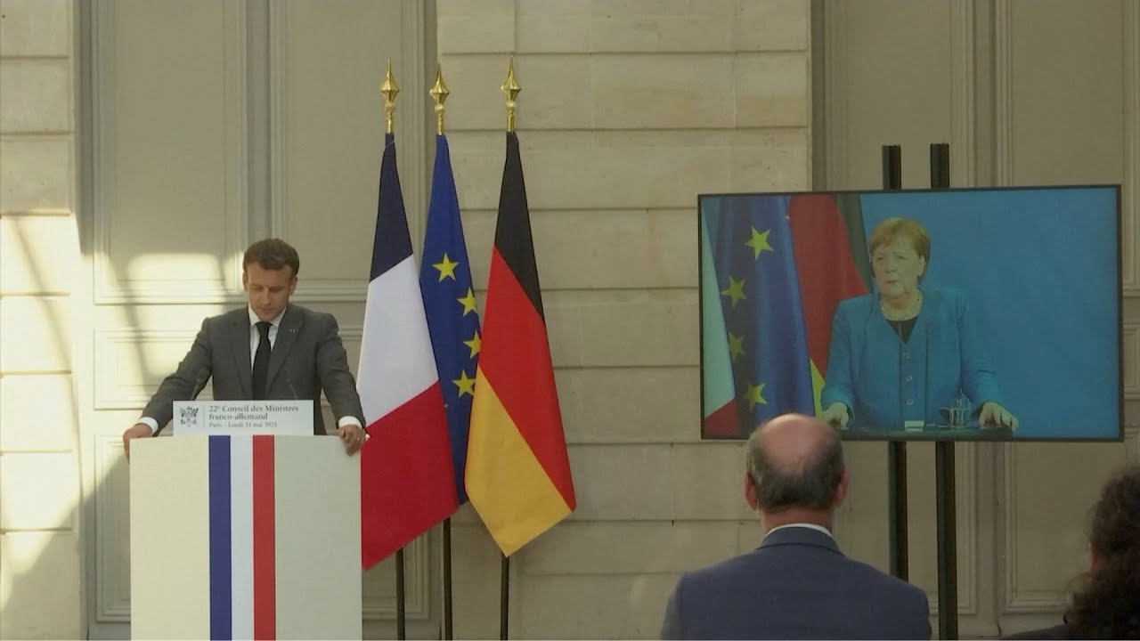 Macron, Merkel demand 'explanations' from U.S., Denmark over spying report