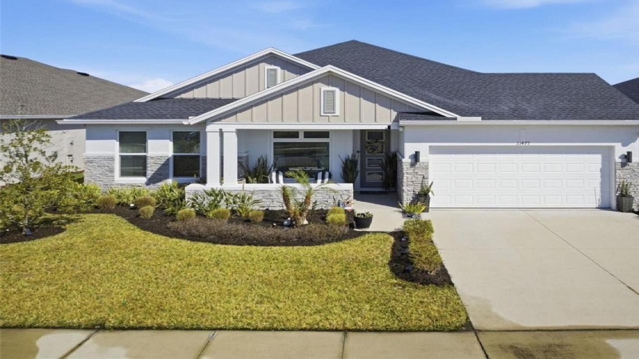 31477 WESTBURY ESTATES AVENUE, WESLEY CHAPEL, FL Presented by TKG.