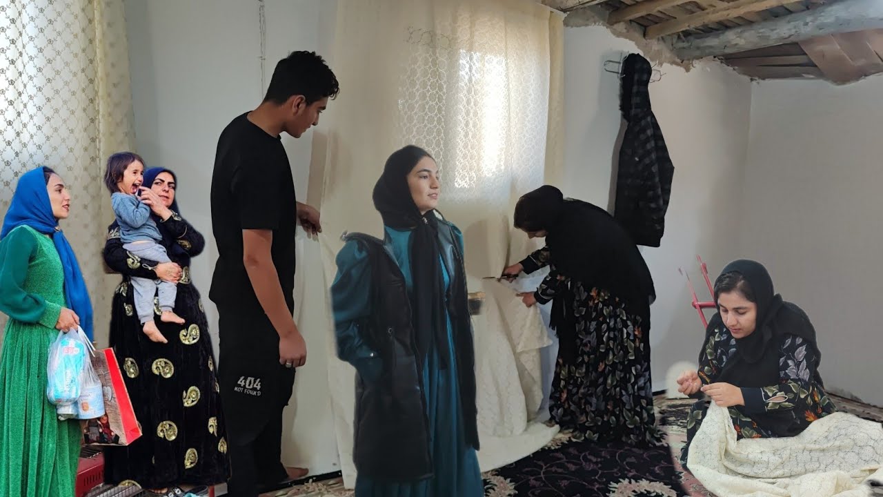 Mahin's family: Sadeq and Farideh are carpeting the house.