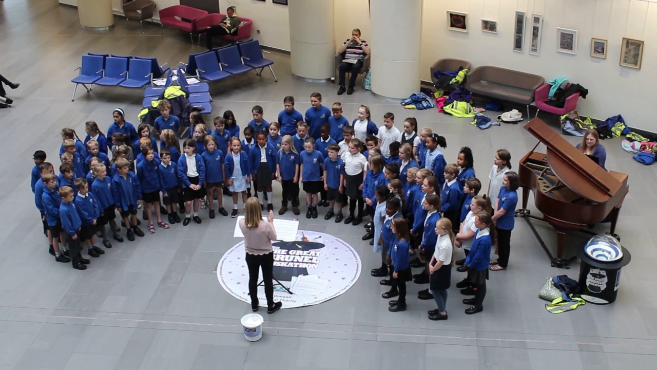 Horfield Primary School choir singing at the Great Brunel Buskathon for Southmead Hospital Charity